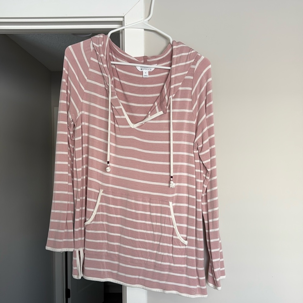 Cute, soft v neck top with ties and kangaroo pocket!